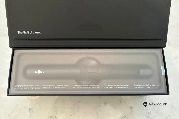 M0de Tooth Brush inside package with logo 2